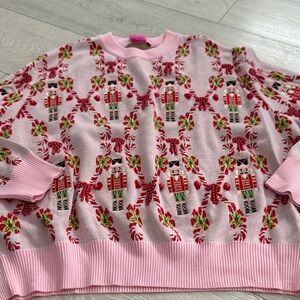 Queen of sparkles light pink nutcracker and candy cane sweater size medium